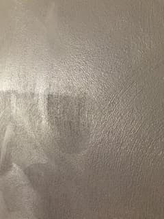Wall texture illuminated by diagonal light